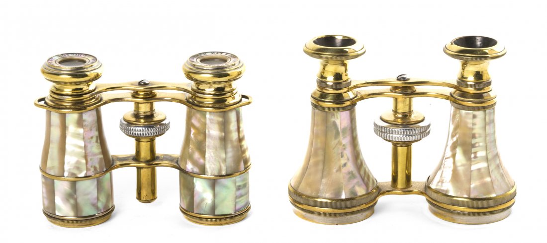 Two Pairs of Mother-of-Pearl Veneered Opera Glass: Two Pairs of Mother-of-Pearl Veneered Opera Glasses, the first marked for McIntosh, Chicago, the second unmarked, each having faceted veneers and gilt metal frames. Width of first 3 3/4 inches. Proper