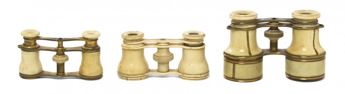 Three Pairs of Ivory and Ivory Veneered Opera Gla: Three Pairs of Ivory and Ivory Veneered Opera Glasses, two with brass frames. Width of widest 4 1/8 inches. Property from the Estate of Mr. Mark Fritz, West Bloomfield, Michigan