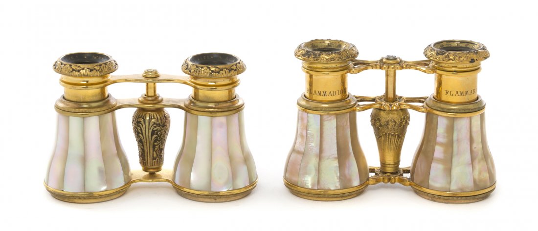Two Pairs of French Mother-of-Pearl Veneered Oper: Two Pairs of French Mother-of-Pearl Veneered Opera Glasses, Flammarion, each with decorated gilt metal eyepieces. Width of wider 4 1/4 inches. Property from the Estate of Mr. Mark Fritz, West Bloomfie