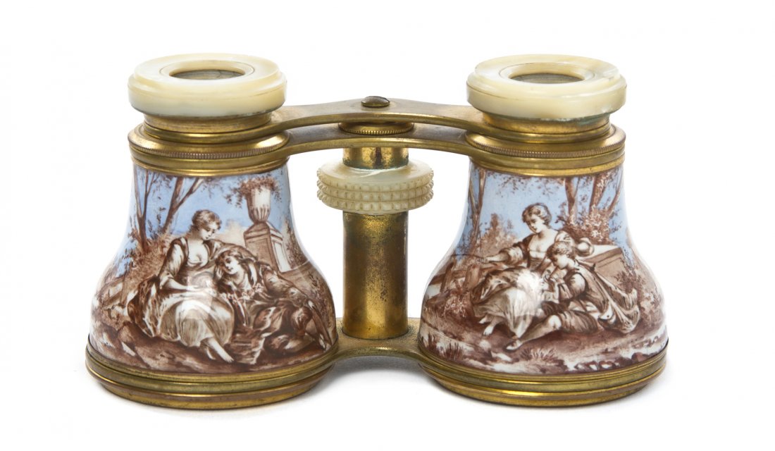 A Pair of French Enameled and Mother-of-Pearl Ins: A Pair of French Enameled and Mother-of-Pearl Inset Opera Glasses, decorated with figures in a continuous landscape. Width 4 1/4 inches. Property from the Estate of Mr. Mark Fritz, West Bloomfield, Mi