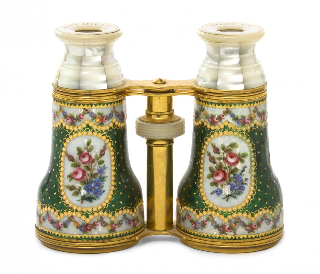 A Pair of French Enameled and Mother-of-Pearl Ven: A Pair of French Enameled and Mother-of-Pearl Veneered Opera Glasses, Tiffany Reed & Co., each cylinder decorated with a cartouche centered with flowers, set on a green reserve. Width 4 1/2 inches. Pr
