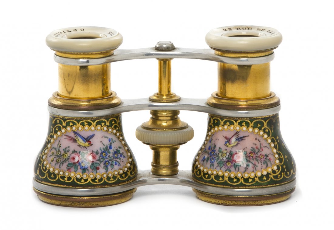 A Pair of French Enameled and Mother-of-Pearl Ins: A Pair of French Enameled and Mother-of-Pearl Inset Opera Glasses, having bird and foliate decoration on a green reserve. Width 4 1/8 inches. Property from the Estate of Mr. Mark Fritz, West Bloomfiel