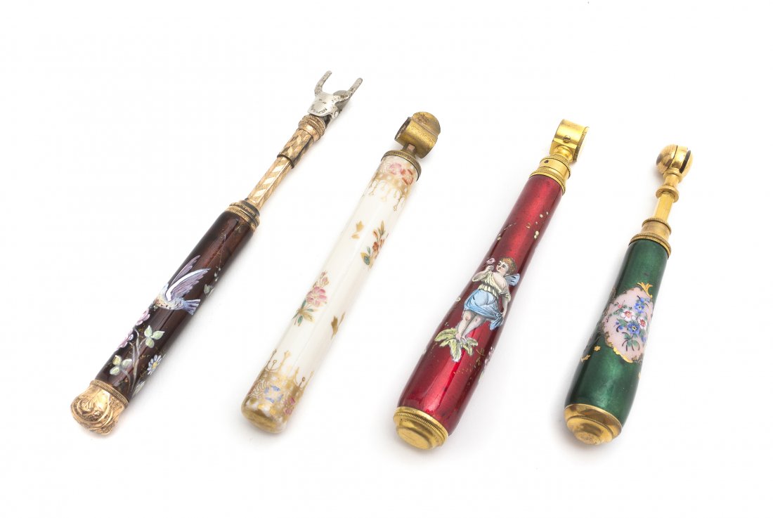 Four Continental Opera Glass Holders, Length of l: Four Continental Opera Glass Holders, comprising three enameled and one porcelain example, having various decorations. Length of longest 6 5/8 inches (closed). Property from the Estate of Mr. Mark Fri
