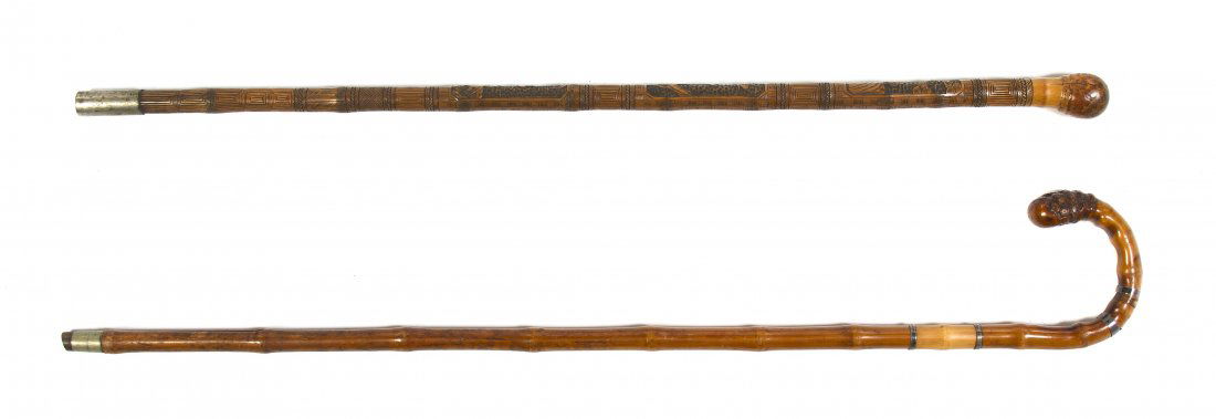 A Bamboo Walking Stick, Height of taller overall: A Bamboo Walking Stick, having carved Japanesque decorated bands of birds in landscapes, ending in a steel ferrule, together with a crook form cane example with sterling silver bands, ending in a silv