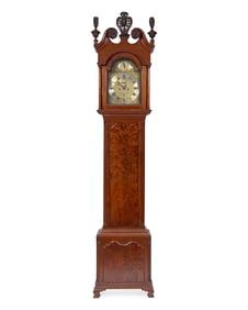 A Chippendale Carved and Figured Walnut Tall Case Clock