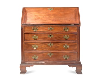 A Chippendale Carved Mahogany Serpentine-Front Slant-Front Desk