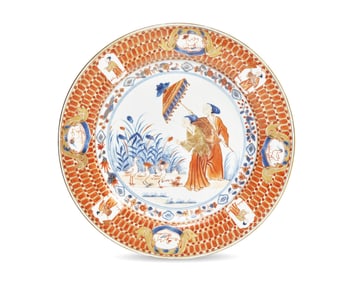 A Chinese Export Porcelain Rouge-De-Fer Plate Depicting "La Dame Au Parasol"