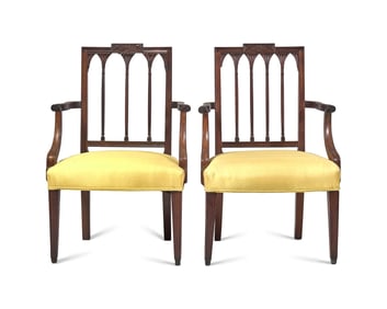 An Assembled Pair of Federal Carved Mahogany Armchairs