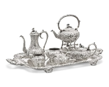 A Six-Piece Sterling Silver Floral Repousse Tea and Coffee Service