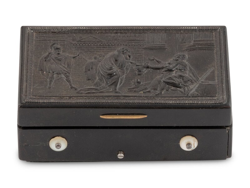 A Musical Snuff Box in a Gutta Percha Case : A Musical Snuff Box in a Gutta Percha Case with 2 1/2 inch cylinder and sectional comb teeth in groups of four, with the lid depicting a scene from Belisaire. Height 1 1/2 x width 3 5/8 x depth 2