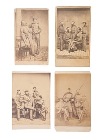 [CIVIL WAR]. 7 CDVs featuring formal and playful studio portraits of 7th New York State Militiamen.