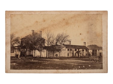 [CIVIL WAR -- ENSLAVEMENT]. CDV of a slave pen "Now used for a Guard House for U. S. Soldiers."