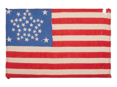 [FLAGS]. 38-star American parade flag with "Great Star" configuration. Ca 1876-1889.