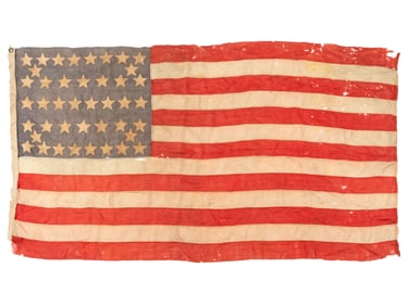[FLAGS]. 42-star American flag with unusual star pattern. Ca 1889-1890.