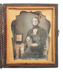 [EARLY PHOTOGRAPHY]. Sixth plate daguerreotype portrait of a possible horologist posed with tools