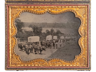 [EARLY PHOTOGRAPHY]. Ambrotype of seven ox-drawn wagons on a road, possibly in Nebraska City, NE. Ca