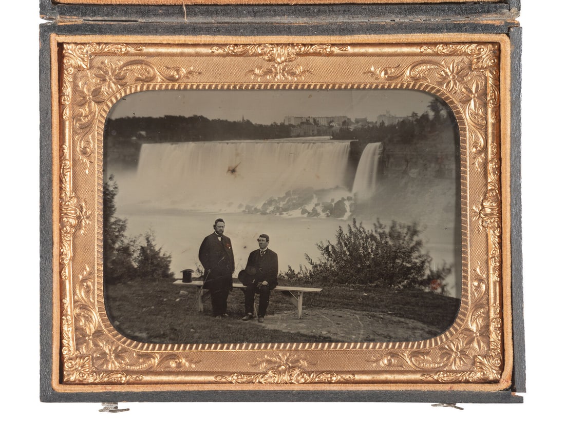 [EARLY PHOTOGRAPHY]. Half plate ambrotype featuring two men posed before Niagara Falls. (1 of 1)