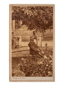 [AFRICAN AMERICANA]. Early post-bellum CDV of a female African American domestic worker standing in