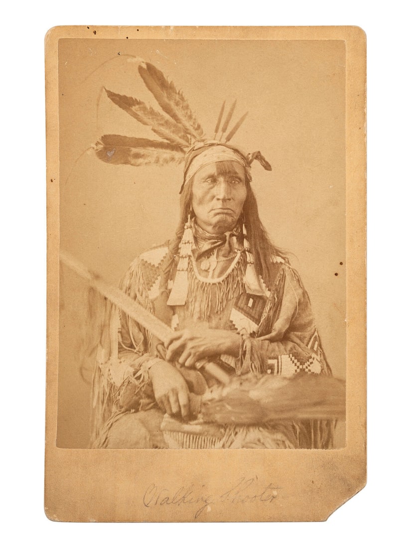 [NATIVE AMERICANS]. GARDNER, Alexander (1821-1882), photographer. Cabinet card of Walking Shooter,: [NATIVE AMERICANS]. GARDNER, Alexander (1821-1882), photographer. Cabinet card of Walking Shooter, Hunkpapa. Washington, DC, ca 1872. Cabinet photograph on cardstock mount of "Walking Shooter," as ide