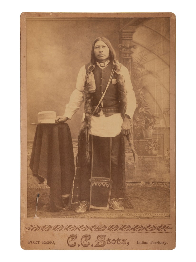 [NATIVE AMERICANS]. Cabinet card of an Arapahoe agency police officer. Fort Reno, Indian Territory: (1 of 2)