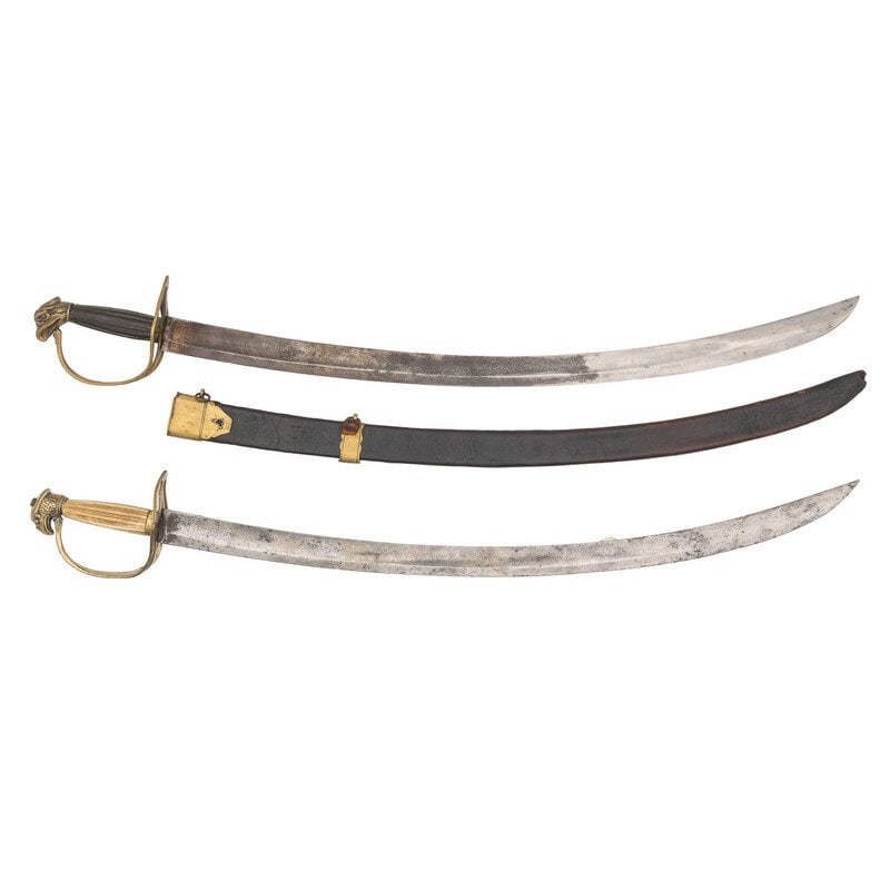 Two Eagle Head Officer's Swords: Two Eagle Head Officer's Swords 1) 27.75" curved singled edged blade with a 22" stopped median fuller, 1.4" wide at the ricasso. 33" in overall length with a 5" hilt having a slotted brass guard with