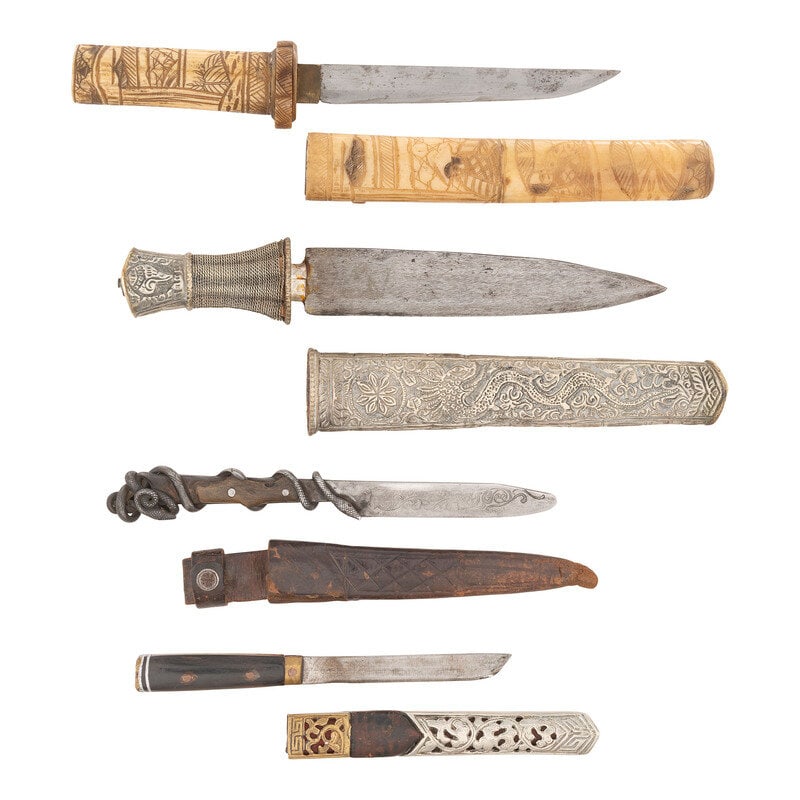Four Ethnographic Daggers: Four Ethnographic Daggers 1.) 6.25" Nagasa (Blade length). 12.125" overall with Tsuka (Hilt) and Saya (Scabbard). Straight single edged Hira Zukuri style blade that has been roughly sharpened and poli