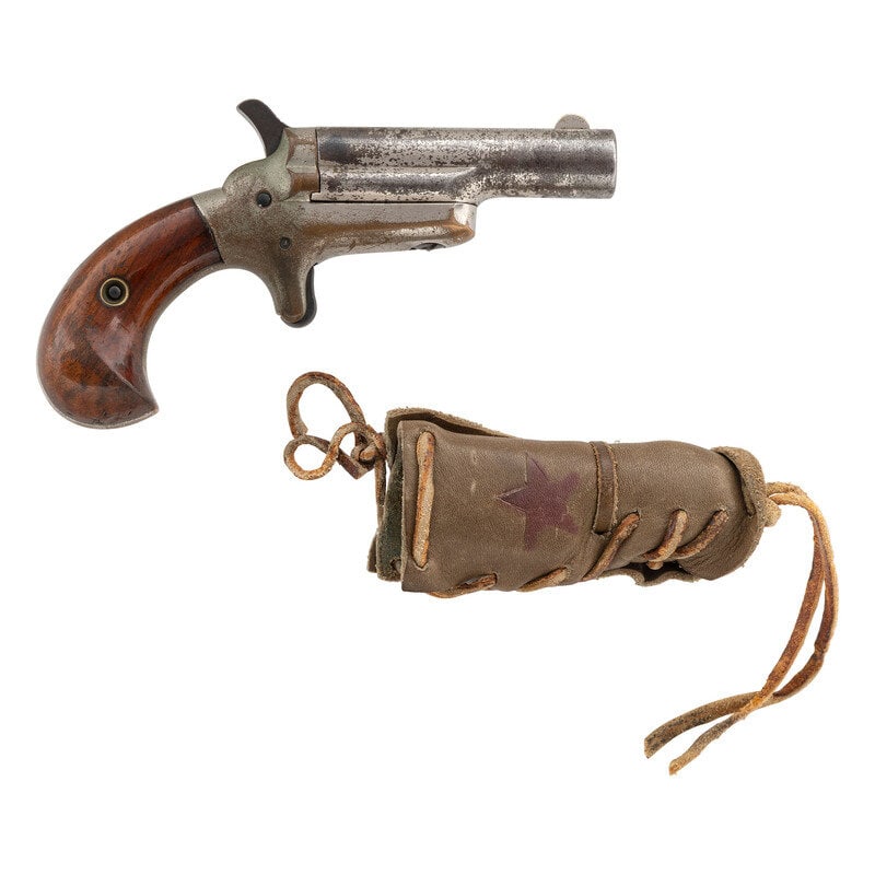 Colt Thuer Derringer: Colt Thuer Derringer .41RF. 2.5" barrel. SN: 7451. Nickel finish, silver plated brass frame, smooth walnut grips. Single shot pivoting barrel single action spur trigger cartridge derringer pistol with