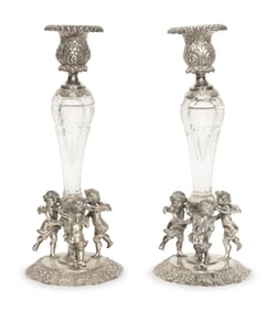 A Pair of German Silver and Cut Glass Figural Candlesticks
