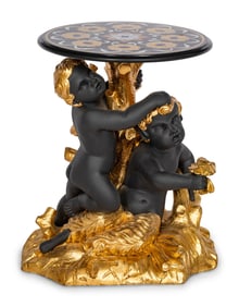 An Italian Painted and Parcel Gilt Walnut Table with a Pietra Dura Top