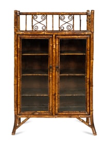 An Edwardian Bamboo and Japanese Lacquer Bookcase