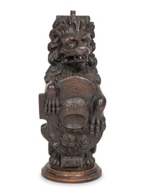 A Carved Oak Figural Newel Post