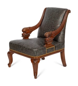 A Continental Carved Mahogany Armchair