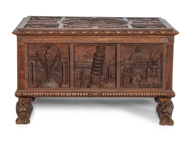 A Continental Carved Oak Lift-Top Trunk