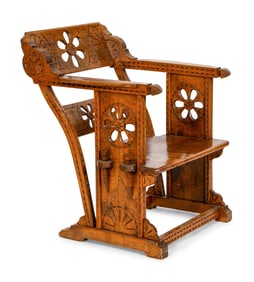 An Italian Carved and Pierced Walnut Armchair