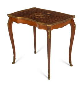 A Transitional Louis XV/XVI Gilt Bronze Mounted Marquetry Writing Table