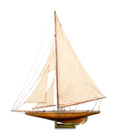 A Four-Sail Gaff-Rigged Pond Yacht on Stand