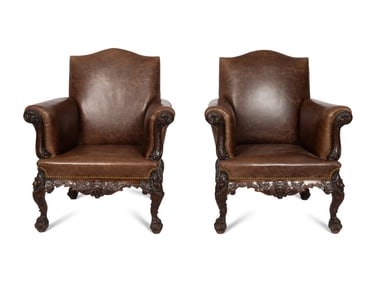 A Pair of Victorian Mahogany and Leather Upholstered Armchairs