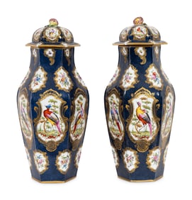 A Pair of Worcester Cobalt Ground Parcel Gilt Porcelain Urns