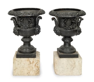 A Pair of Large Cast Iron Campagna-Form Jardinieres on Fossilized Coral Limestone Plinths