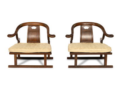 A Pair of Baker Furniture Walnut Horseshoe Back Chairs: A Pair of Baker Furniture Walnut Horseshoe Back Chairs Michael Taylor Far East Collection, Mid 20th Century with pale yellow damask silk-covered seat cushions, both chairs bearing Baker Furniture plaq