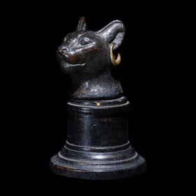 An Egyptian Bronze Head of a Cat