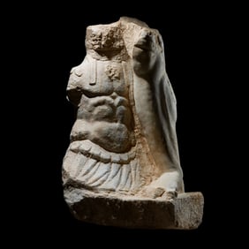 A Roman Marble Fragment from a Monumental Statue of the God Mars