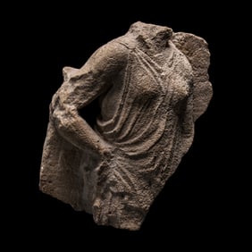 A Tarantine Limestone Relief of a Draped Female