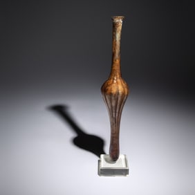 A Roman Aubergine Glass Unguentarium