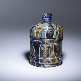 A Roman Marbled Cast Glass Pyxis