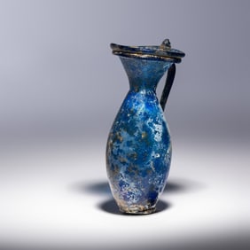A Late Roman Blue Glass Jug