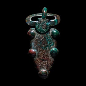 A Merovingian Tinned-Bronze Belt Buckle