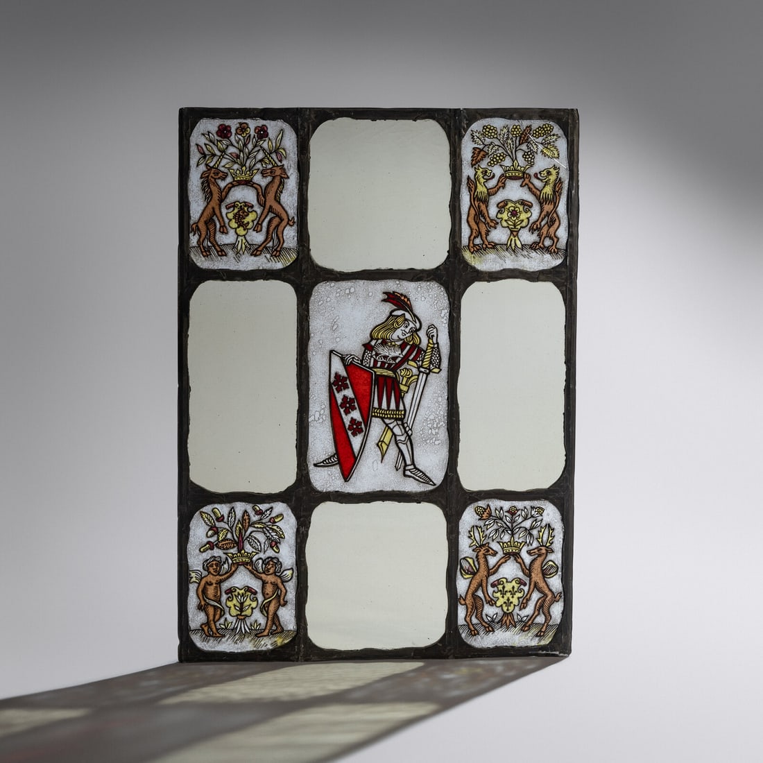 Linden Glass Company (Chicago, 1884–1934) Nine-panel window depicting knight (1 of 2)