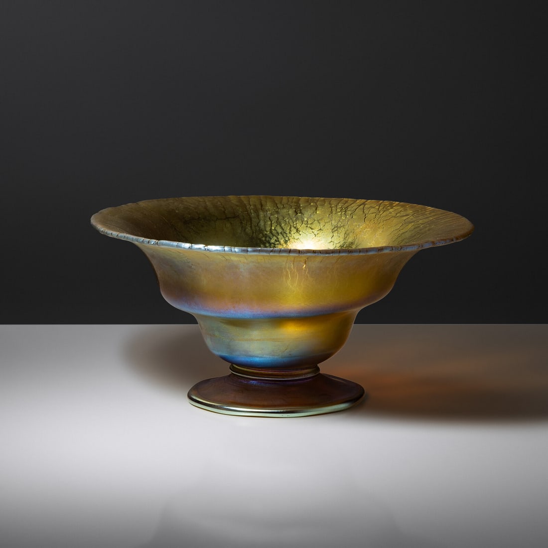 Leslie H. Nash (English, 1886–1958) An Important Favrile bowl for Tiffany Studios: Leslie H. Nash (English, 1886–1958) An Important Favrile bowl for Tiffany Studios favrile glass Notable Signature, etched to underside '$100 Last piece made by L. C. Nash' and 'LCT, Favrile' 3&frac3