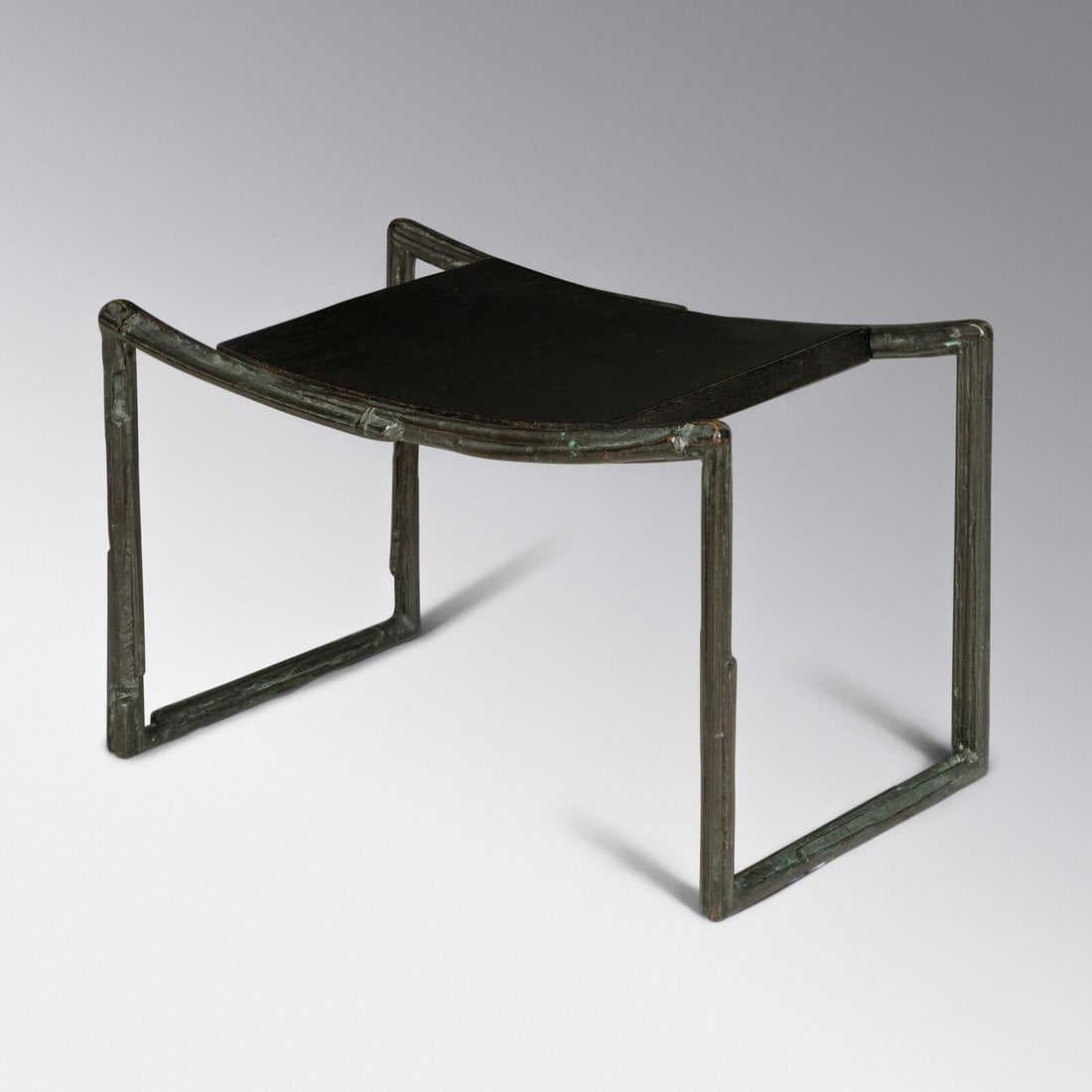 Bruno Romeda (Italian, 1933–2017) Tabouret/Stool BRM01, 1997: Bruno Romeda (Italian, 1933–2017) Tabouret/Stool BRM01, 1997 patinated bronze and ash impressed Romeda 97 to base. 14½ × 23 w × 15 d in (37 × 58 × 38 cm) This lot is loc